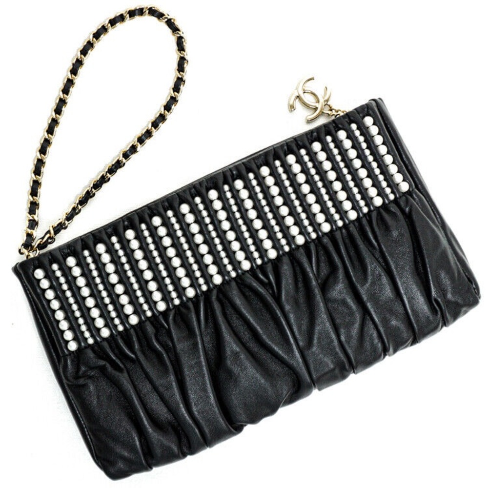 CHANEL Black Vintage and Elegant Clutch with Faux Pearls